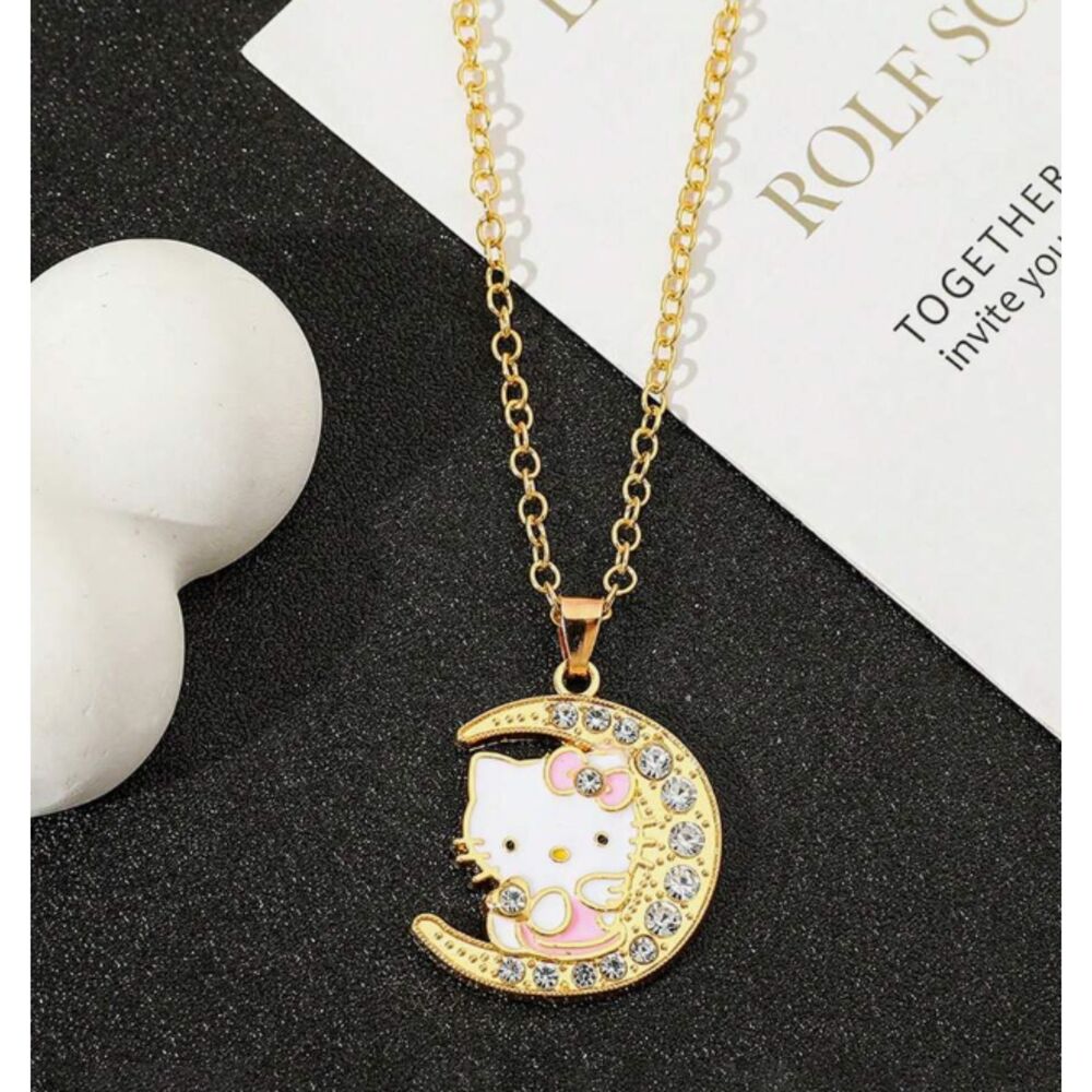 Sanrio gold Hello Kitty Sitting on a Moon with Crystals Necklace